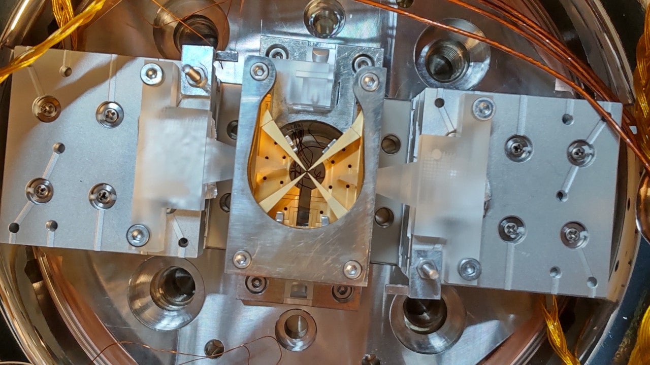 Header image for the OIST press release OIST spin-out startup Qubitcore advances toward social implementation of Japan-made ion trap quantum computers