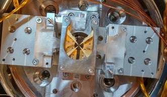 Header image for the OIST press release OIST spin-out startup Qubitcore advances toward social implementation of Japan-made ion trap quantum computers