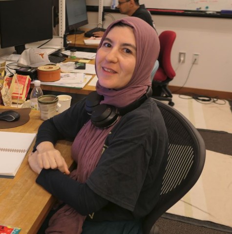 A woman sitting in an office