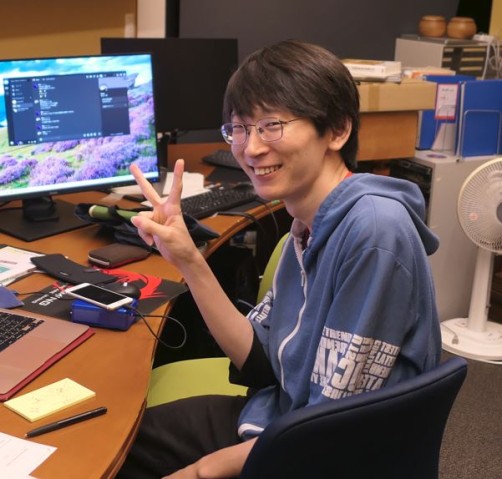 Man sitting in front of a computer