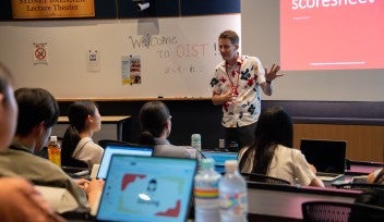Summer school participants at a lecture