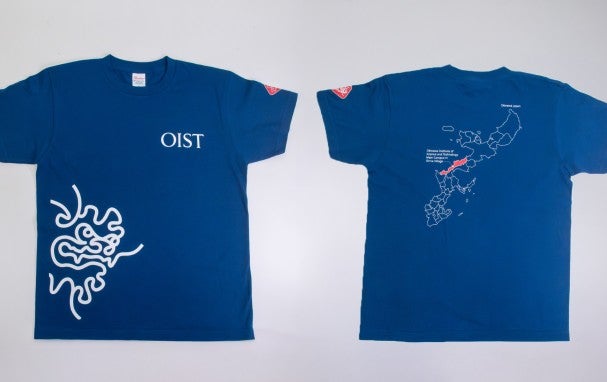 blue T-shirt with OIST logo on the front and a map of Okinawa on the back